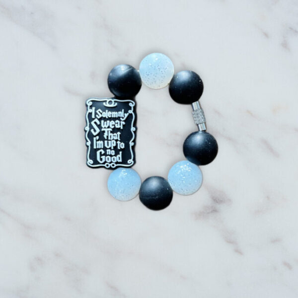 Solemnly Handle Charm